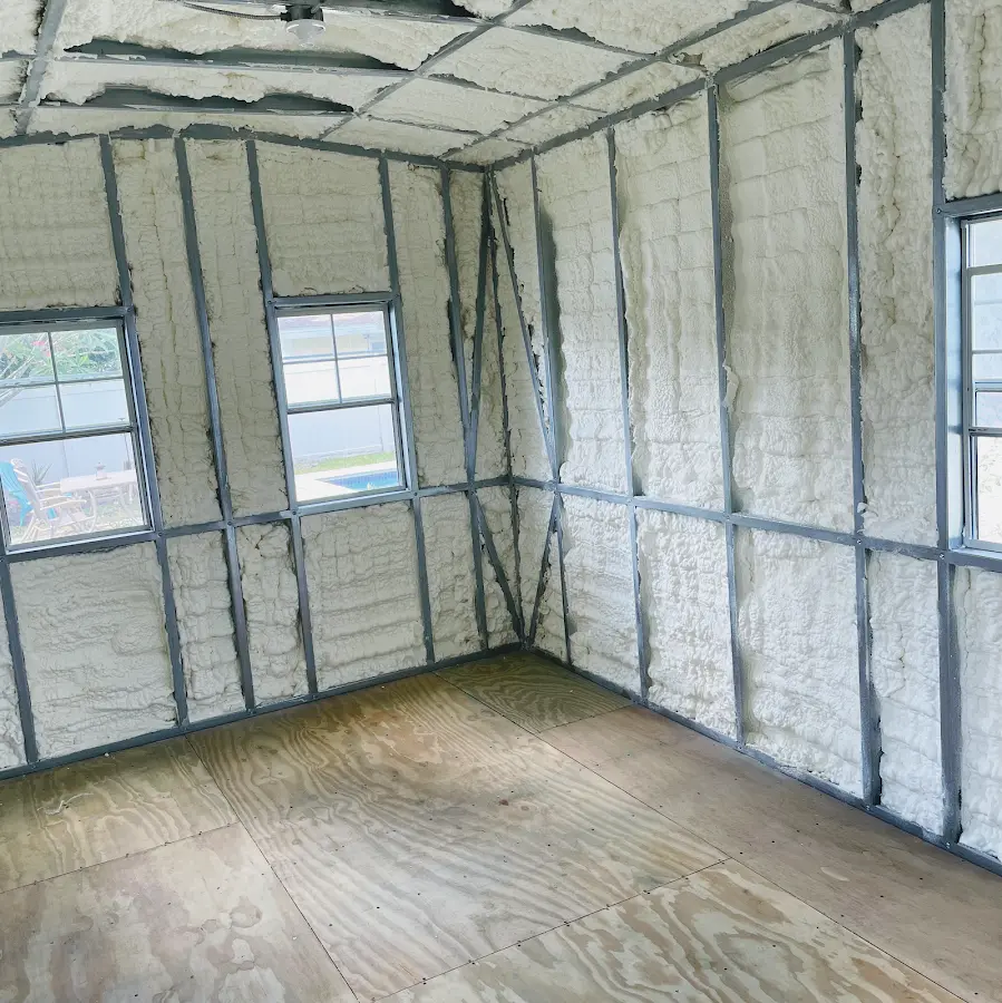 Closed-cell spray foam insulation applied to wall cavities in a residential project in Riverview